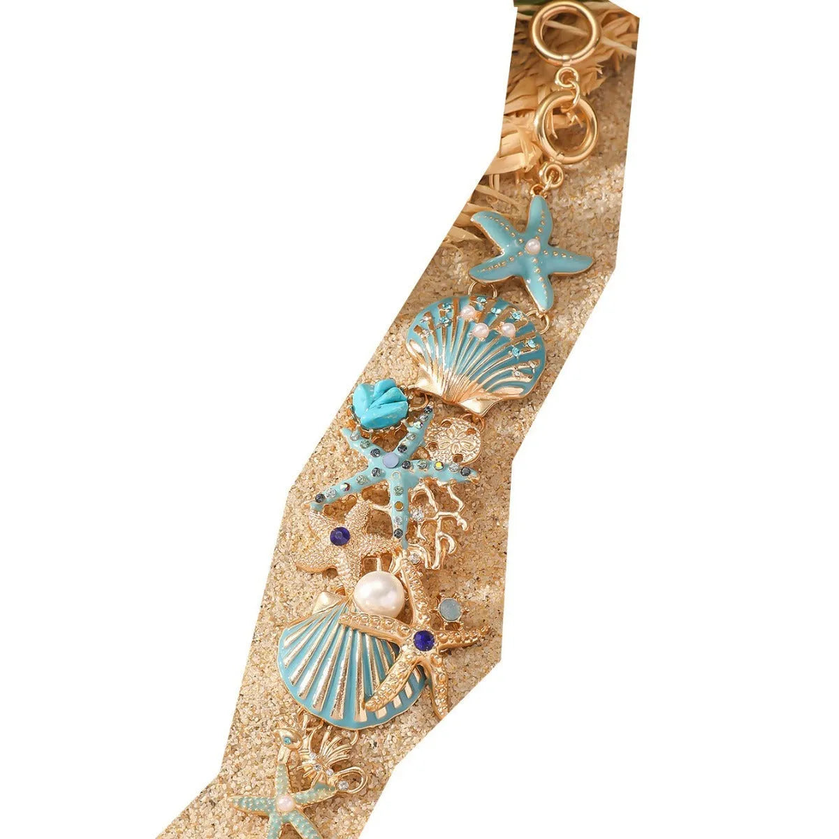 Alloy marine-themed bracelet with anchor and starfish charms in blue colour