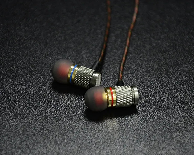 Black wired in-ear headphones with metal subwoofer drivers and L-bend 3.5mm plug