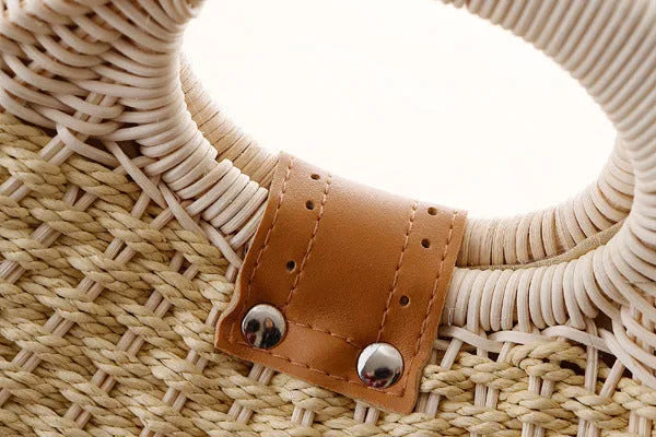 Rattan handbag in round woven straw style with hard shell and inner pocket