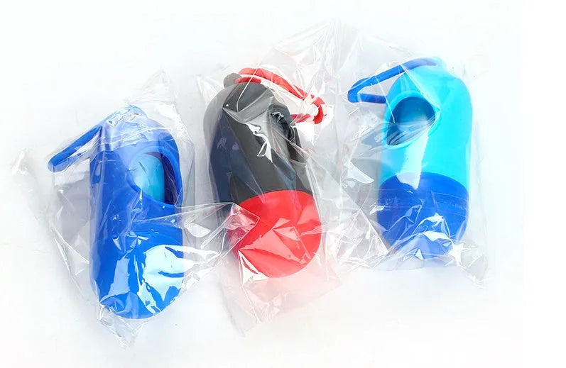 Roll of 22.5x30cm black dog poop bags with handle tie closure for pet waste cleanup