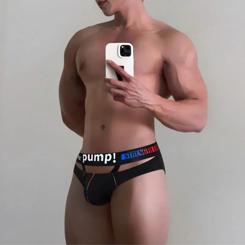 A pair of solid black men's low-rise modal briefs laid flat on a white background.