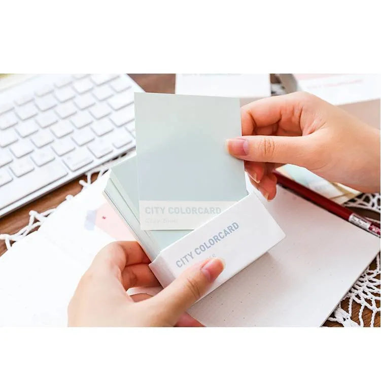 Rectangular memo note pad with creative city colour design, measuring 75 by 95 millimetres.