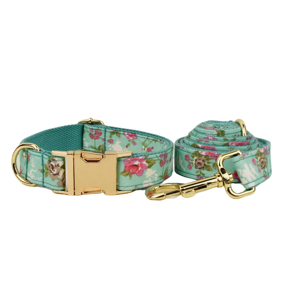 Rose floral pattern dog collar and leash set with green background, detachable bow, and matching dog vest