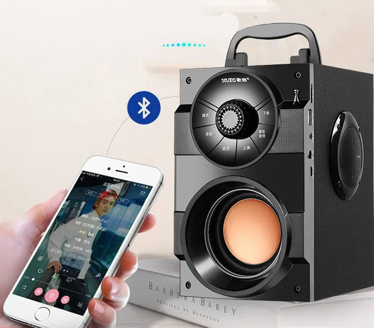 Black portable audio system with subwoofer and 3.5mm audio cable for connecting to phones and laptops