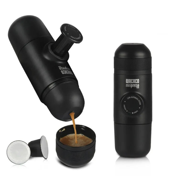 Black portable manual coffee machine showing compact 6cm design with pressure system for travel brewing