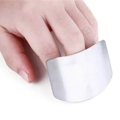 Stainless steel finger guard for kitchen safety during vegetable chopping tasks