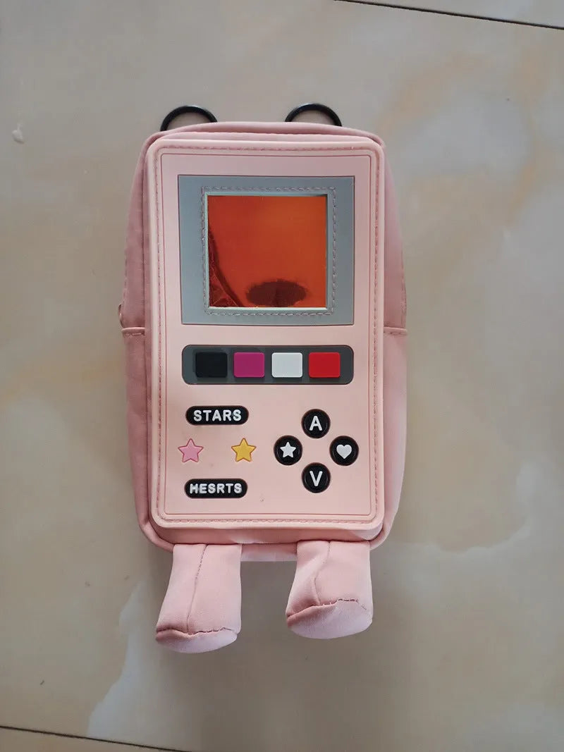 Small messenger bag in dark pink made from Oxford cloth with zipper closure and stitching detail