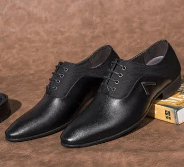 Men's black Oxford shoes with a low-cut PU leather upper and rubber sole.