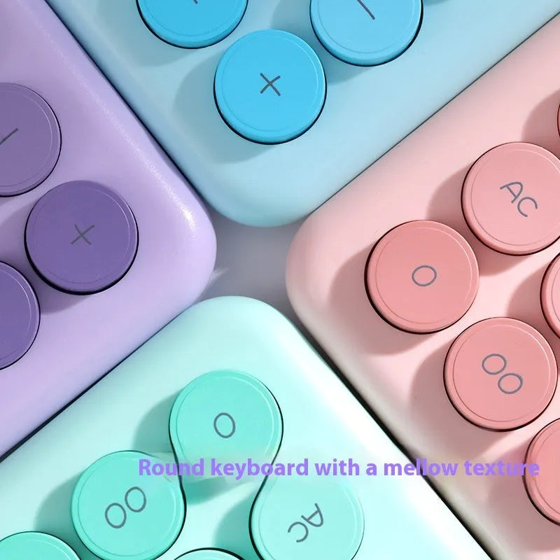 Desk calculator with gradient colour finish in pastel violet, pink, blue, or green.
