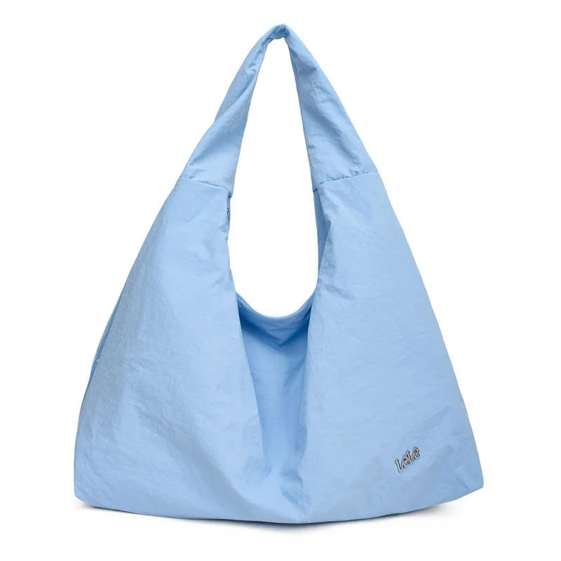 Women's heart-shaped nylon underarm bag in black, blue, khaki, and yellow colour options