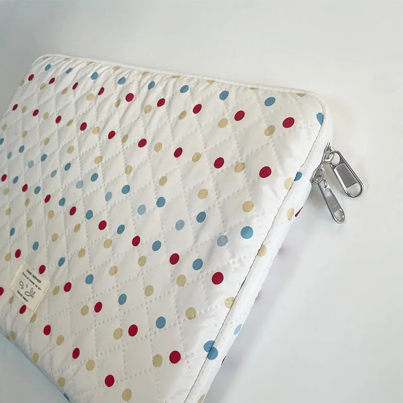 Women's polka dot polyester laptop bag shown in solid colour, suitable for 11-inch to 15.6-inch devices.