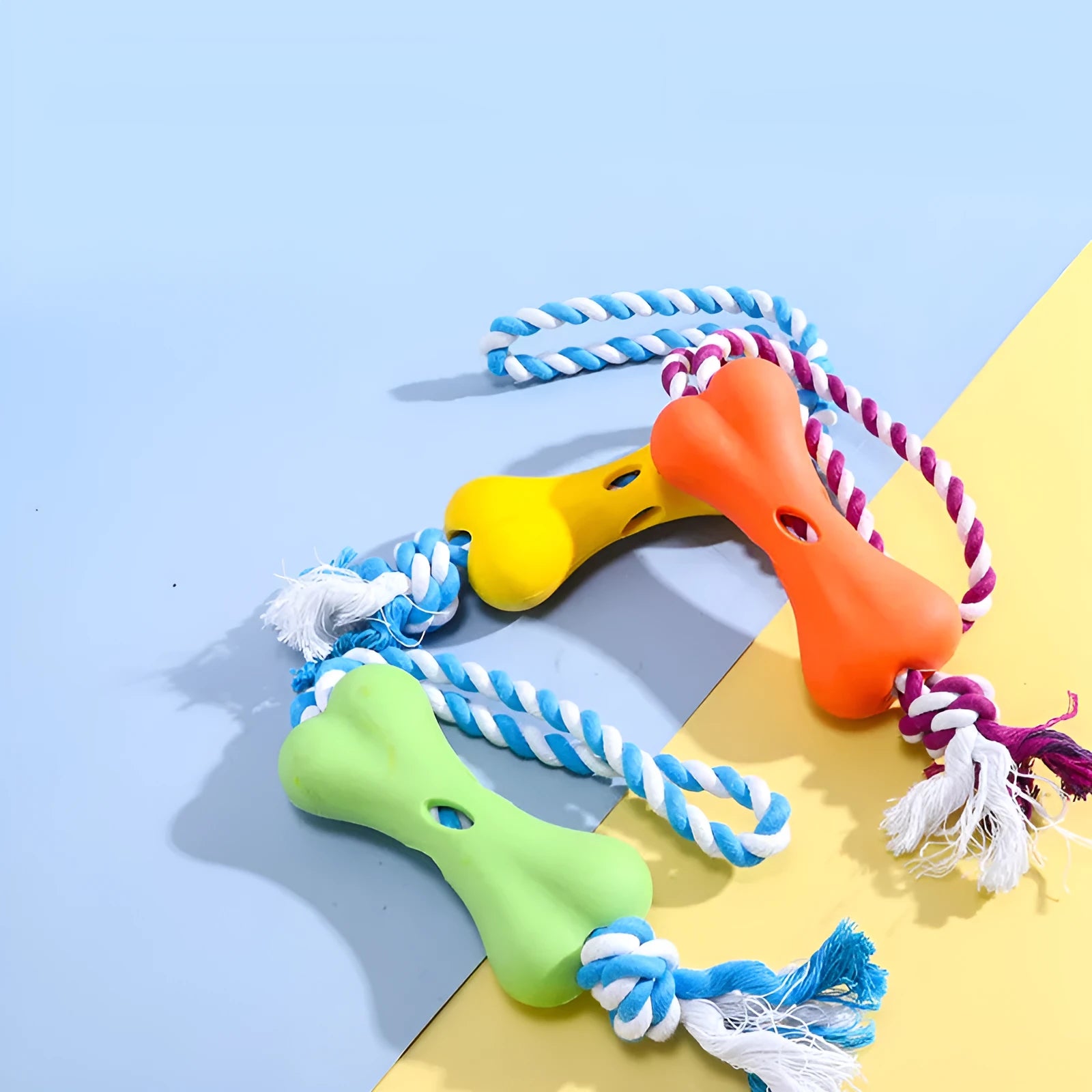 Green pet porous bone rope knot chew toy for dogs with treat stuffing openings