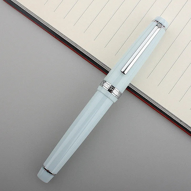 Resin business pen with stainless steel nib shown in a selection of colour and clip finish options.