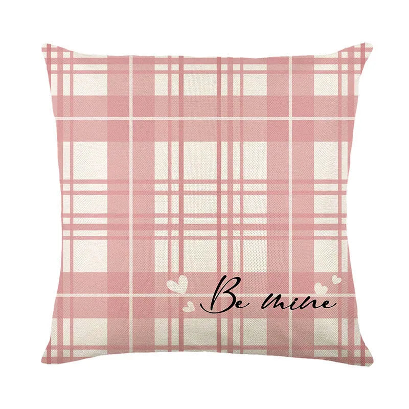 Red and white plaid heart printed pillow cover on a cushion, 45 centimetres square.
