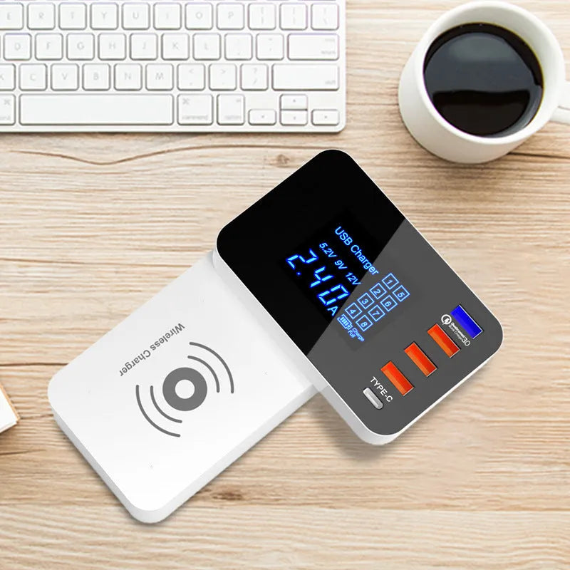 White multi-port USB fast charger with travel plug adapters and a long cable on a desk.