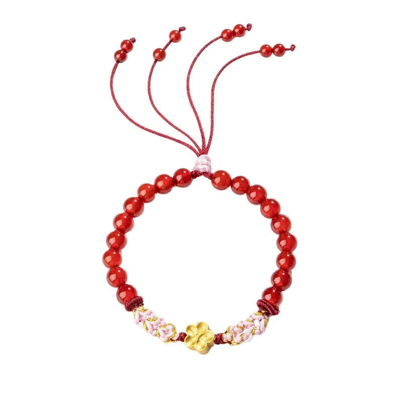 Hand-woven women's bracelet with natural crystal peach blossom charm and adjustable rope strap
