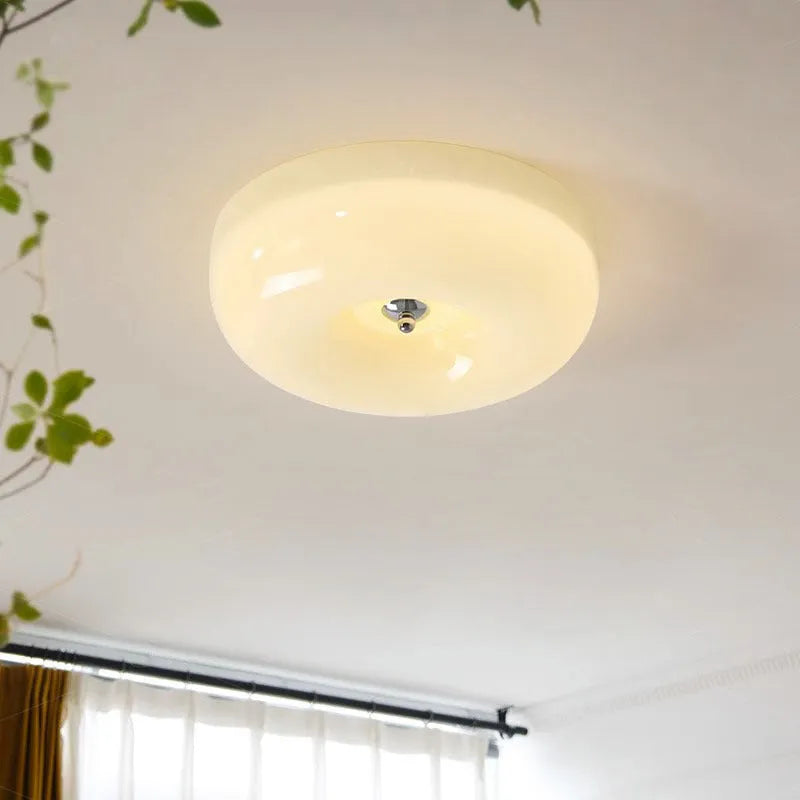 Cream-coloured American vintage style bedroom ceiling light with three-colour settings.