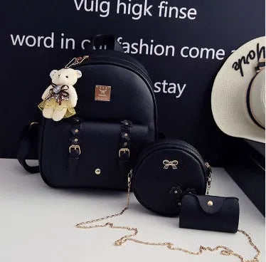 Women's 3-piece floral print PU leather bag set showing backpack, shoulder bag, and card purse in pink.