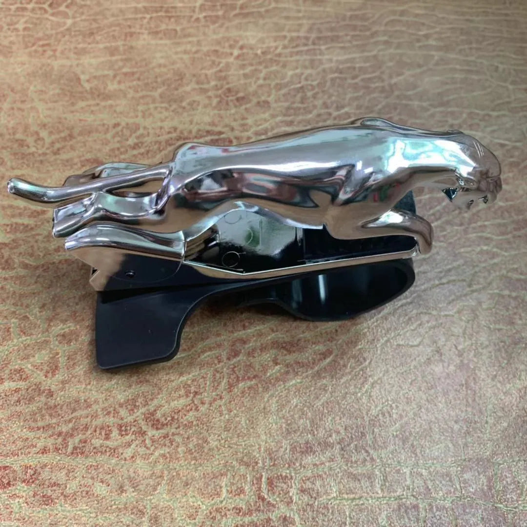 Rotatable car mobile phone holder in black, gold, and silver finishes made from ABS plastic.