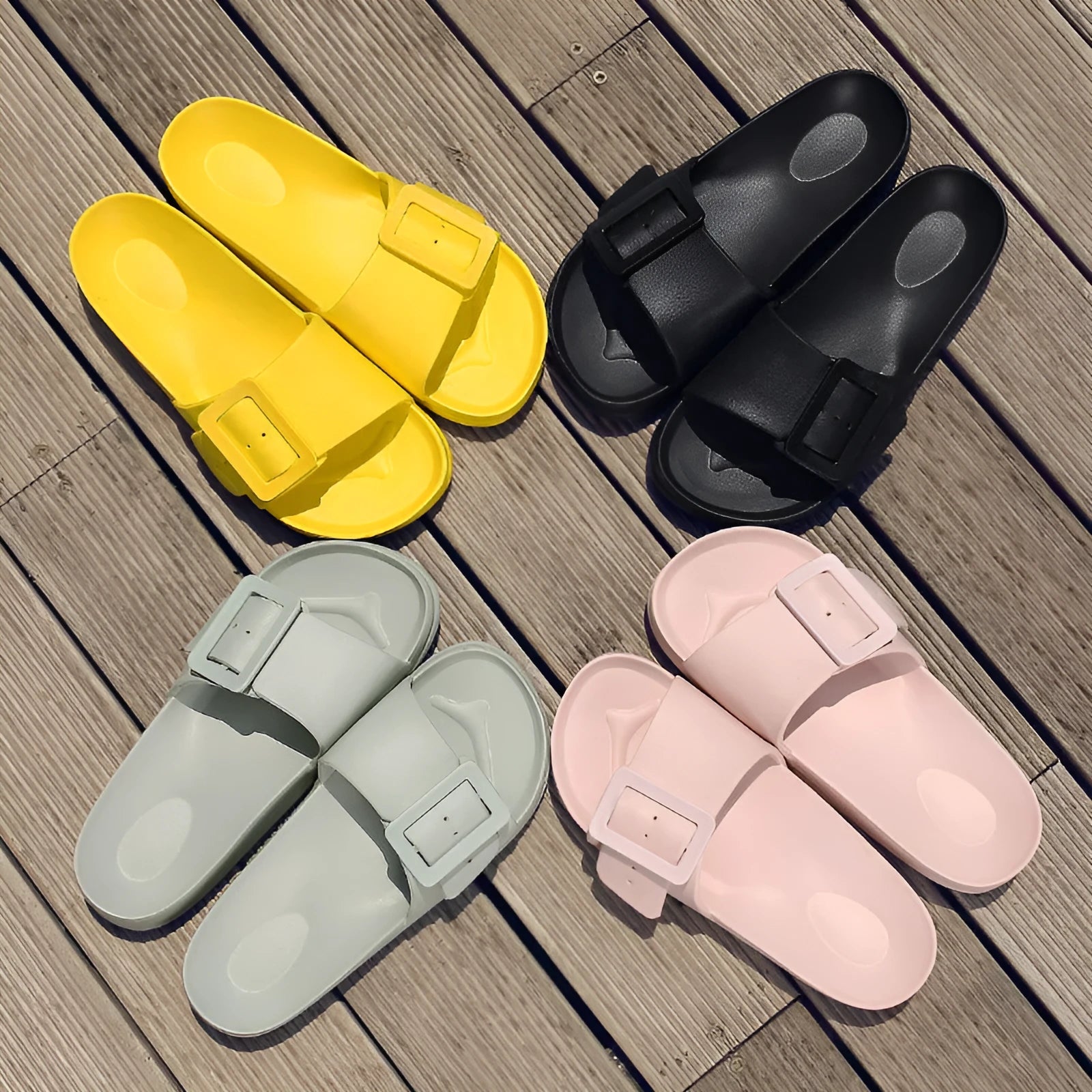 Women's grey blue flip-flop sandals with a buckle strap and soft EVA sole.