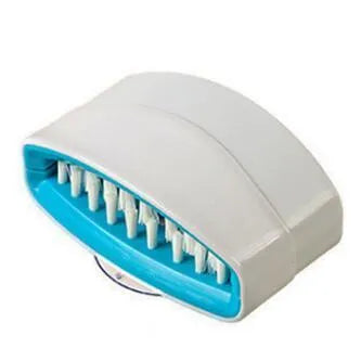 Blue kitchen cleaning brush with suction cup showing knife and fork design for washing fruits and vegetables