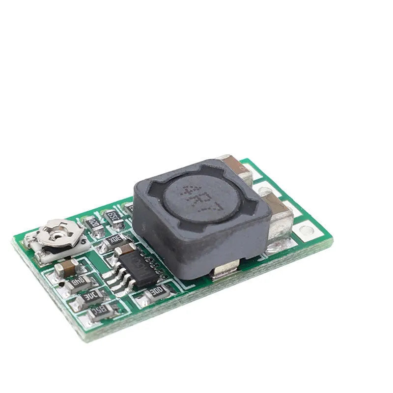 Green circuit board DC-DC power module converting 12-24V to 5V with 3A output capacity