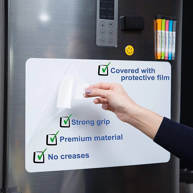 A3 size flexible magnetic whiteboard with rounded corners on a refrigerator door