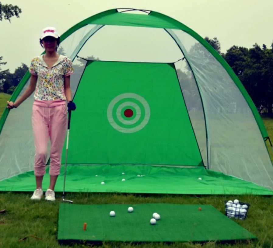 Black and green golf practice net tent set up on grass with fibreglass poles and target sheet