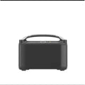 Rui Pro 720Wh portable power station with multiple output ports on a wooden surface outdoors.