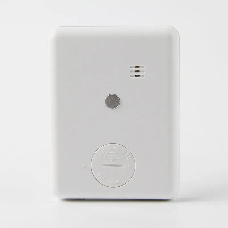 Magnetic kitchen timer in black and white colour options showing front display and magnetic back