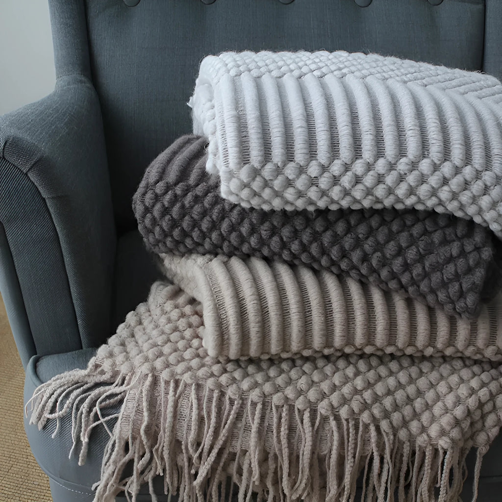 Polyester fibre small throw blanket in dark grey, khaki, or light grey, showing its 127x170cm size.