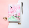 Muco hardcover notebook with Sakura flower orbit design in pink, green, red, or yellow colours