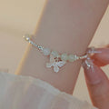 Hetian jade and silver butterfly bracelet and necklace set for women on electroplated copper