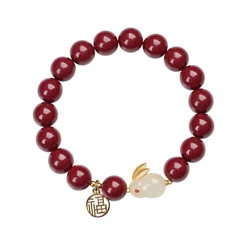 Cinnabar jade hare bracelet with purple gold sand colour beads in 6mm or 8mm size options