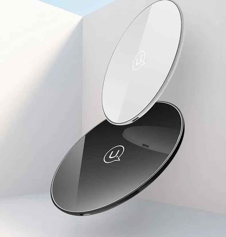 Glass disc wireless charger showing black and white colour options with charging indicator