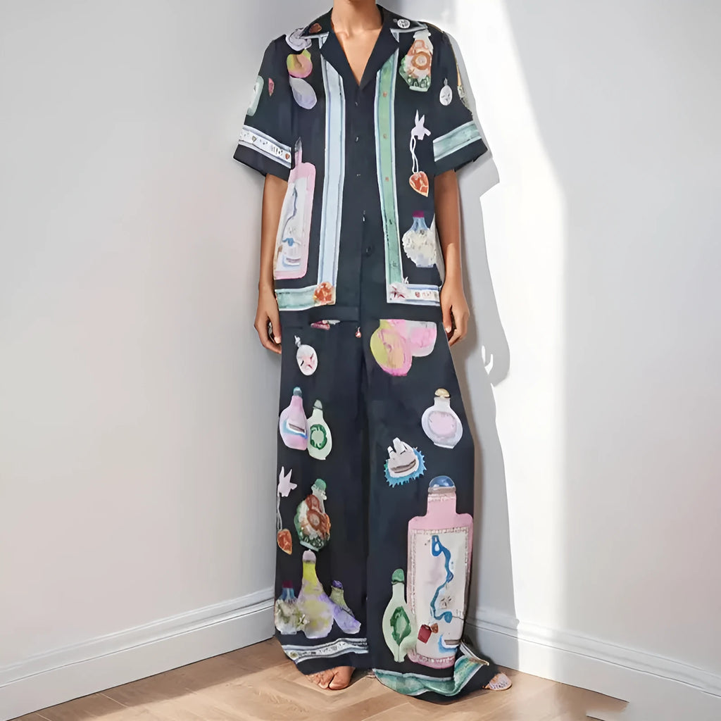 Black women's casual set with cartoon pattern featuring cardigan top and trousers