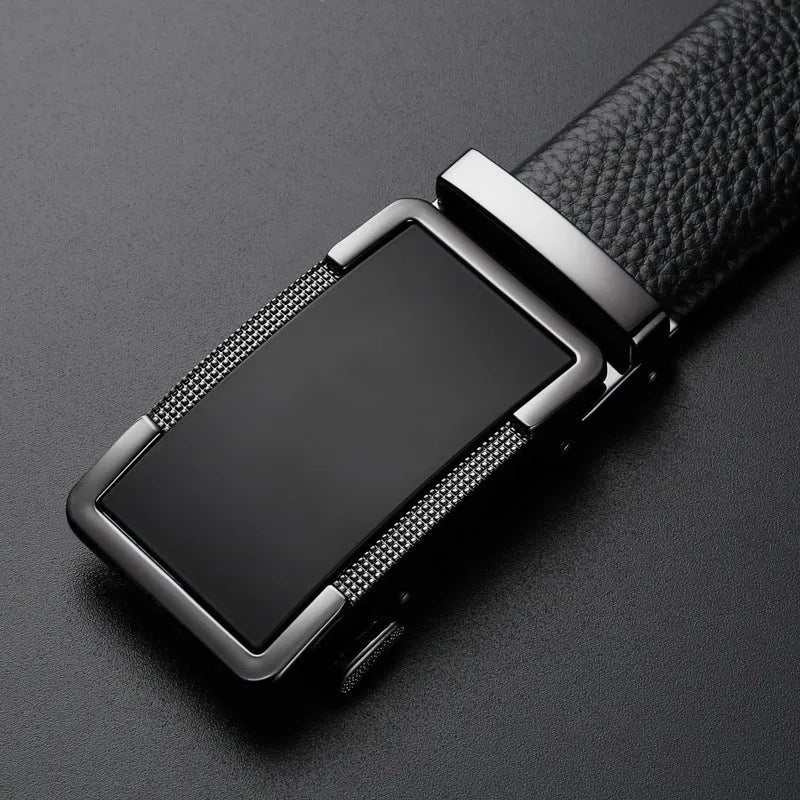 Men's gun black leather belt with a silver automatic comfort click buckle fastened.