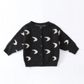 Nordic style baby jumpsuit in oatmeal colour with long sleeves, cotton fabric, unisex design
