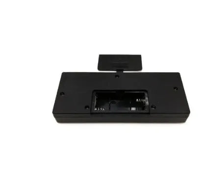Black HD TV game console with wireless controller and USB cable on a table, showing built-in classic games