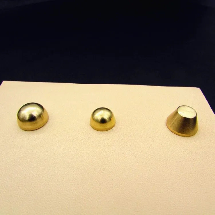 Brass decorative buckle and foot nail jewellery findings in 10x6mm and 12x7mm sizes.