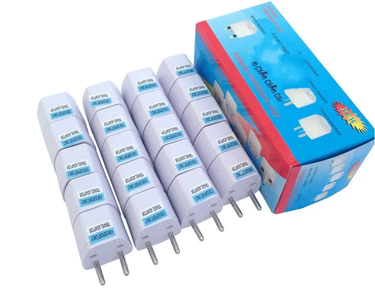 A multi country travel conversion plug for British, American, Australian, and European power sockets.