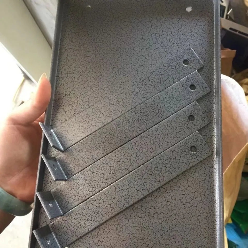 Black iron flip chip bracket accessory for a portable electric planer.