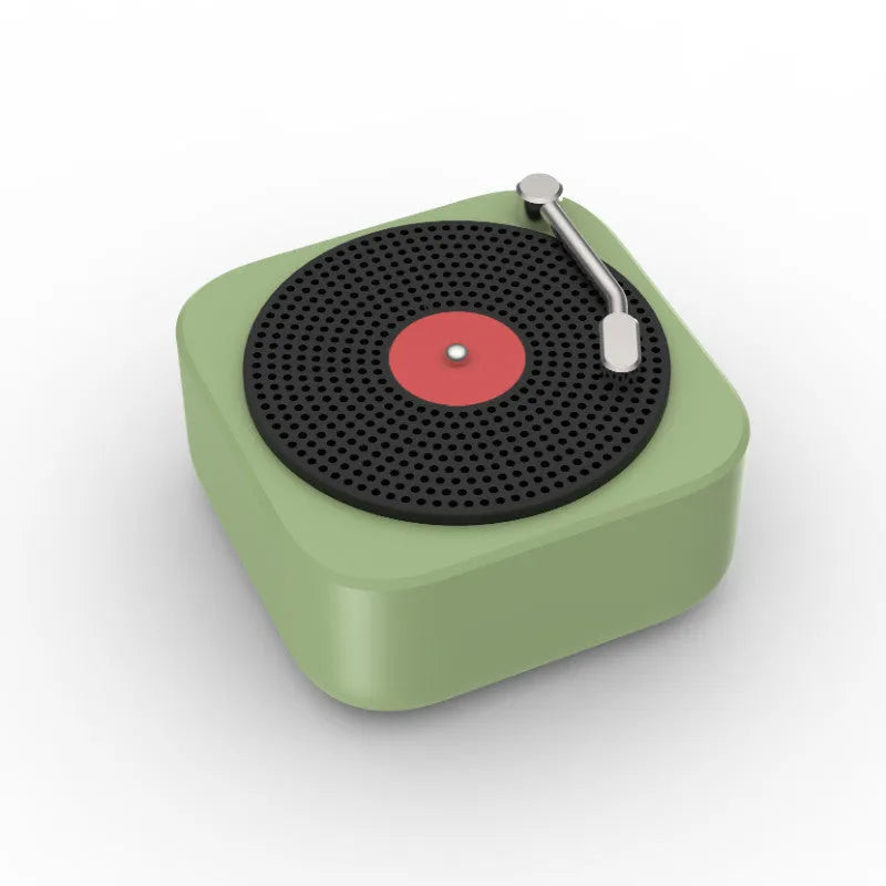 Wireless mini portable Bluetooth speaker in compact design with USB charging, available in blue, green, orange, white colours