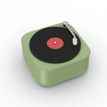Wireless mini portable Bluetooth speaker in compact design with USB charging, available in blue, green, orange, white colours