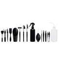 Black succulent garden tools set with shovel, tweezers, scissors, watering bottle and a square grey cushion.
