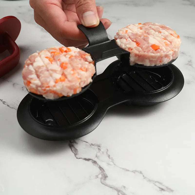 Black burger press mould on kitchen counter making hamburger patty