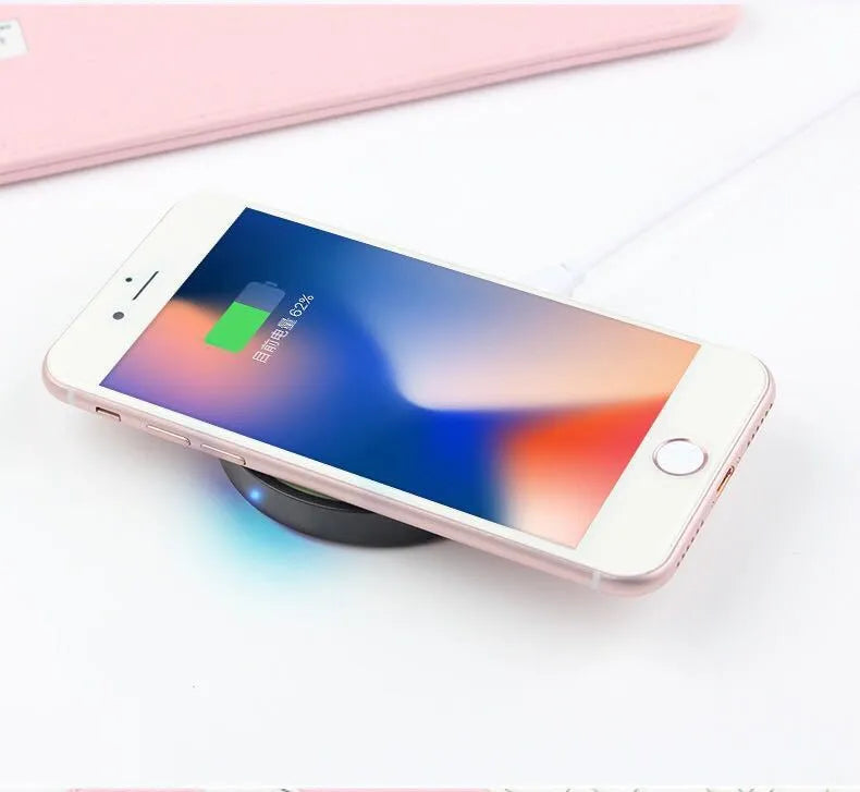 Square wireless charging pad in one of six colours: black, blue, orange, red, white, or yellow.