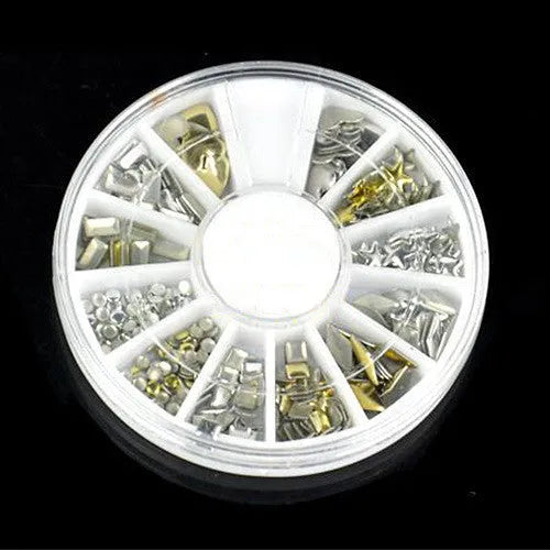 Gold and silver acrylic nail art stickers on a white backing sheet, ready for DIY nail decoration