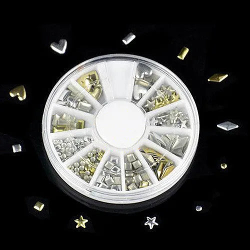 Gold and silver acrylic nail art stickers on a white backing sheet, ready for DIY nail decoration
