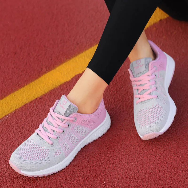Women's white flat board high-top shoes with back lacing and a cross bind strap detail.